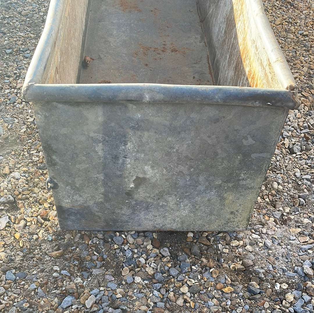 Vintage galvanised rustic water trough planter.