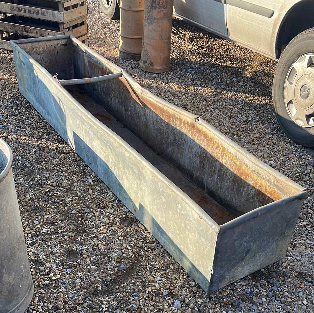 Vintage galvanised rustic water trough planter.