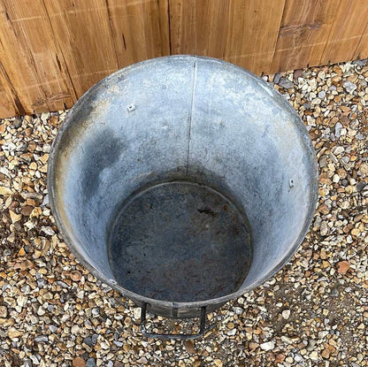 Tapered sided rustic galvanised two handled bin garden planter aged black paint.