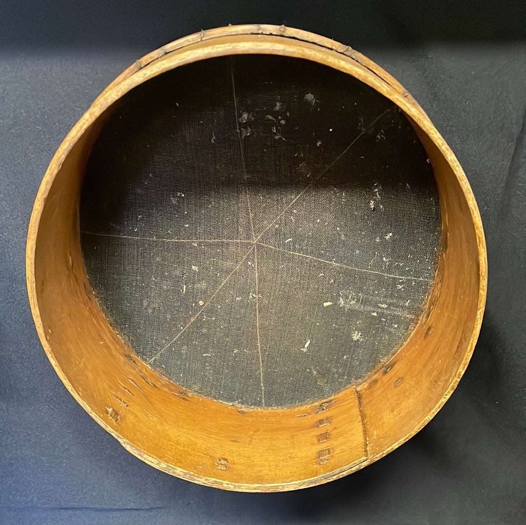 Vintage bent wood flour sieve.