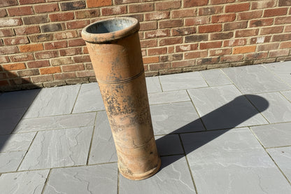 Large vintage pale terracotta chimney pot.