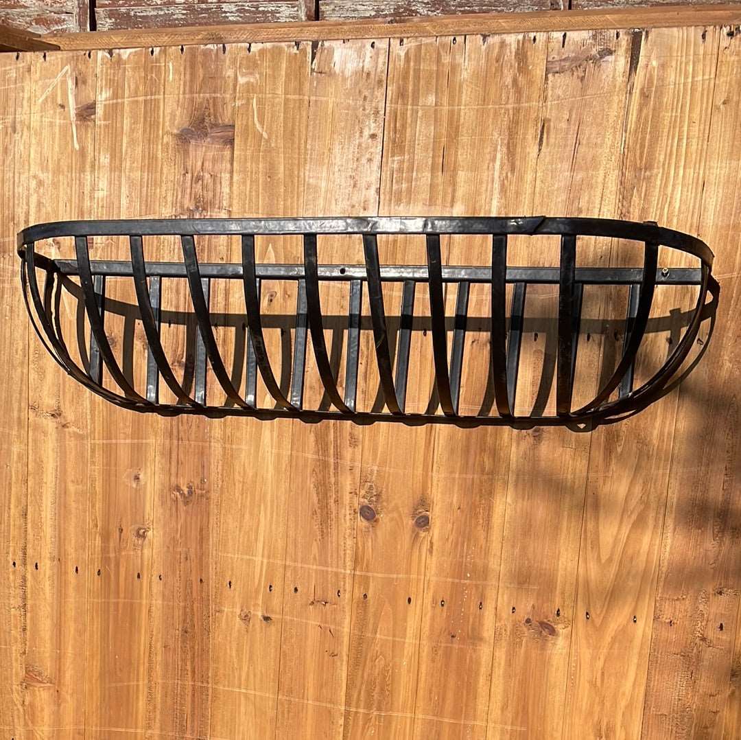 Metal flaky black wall basket planter.