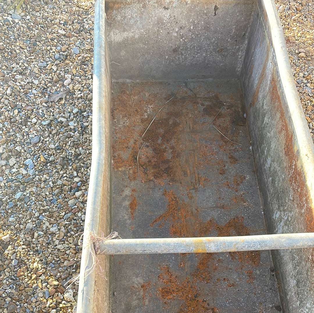 Vintage galvanised rustic water trough planter.