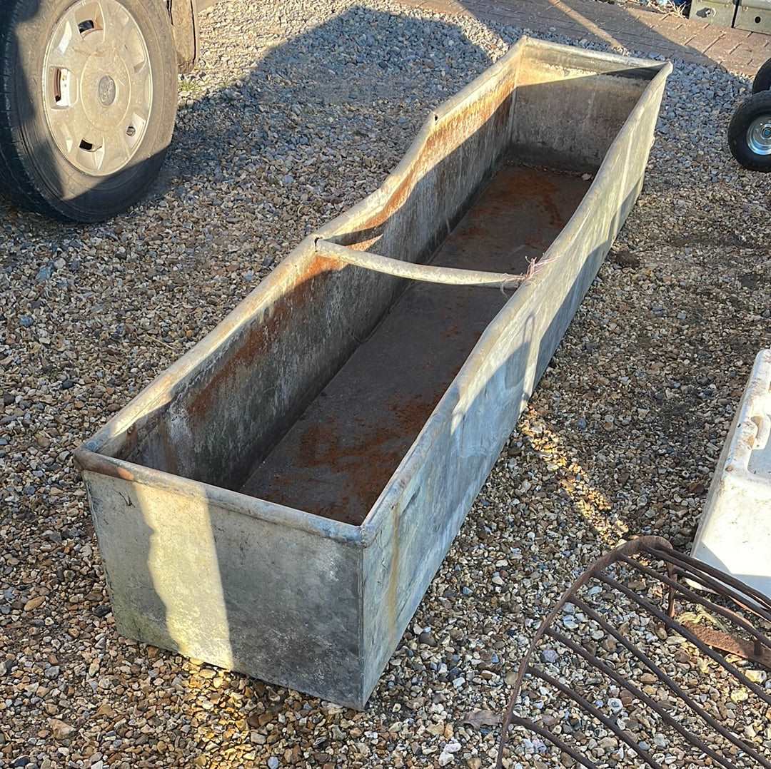 Vintage galvanised rustic water trough planter.