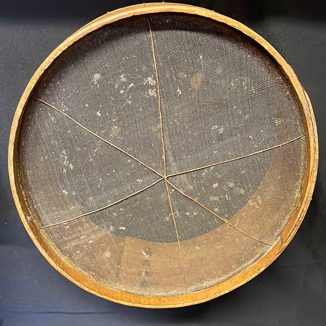 Vintage bent wood flour sieve.