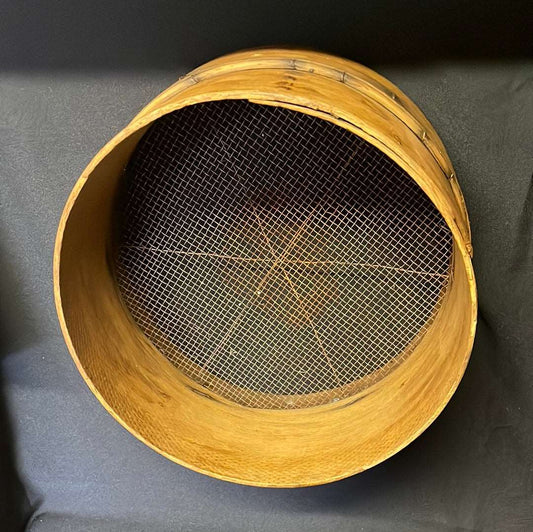 Vintage bent wood grain sieve.