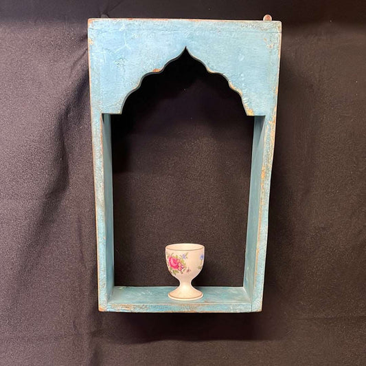 Single Indian blue wooden temple shelf.