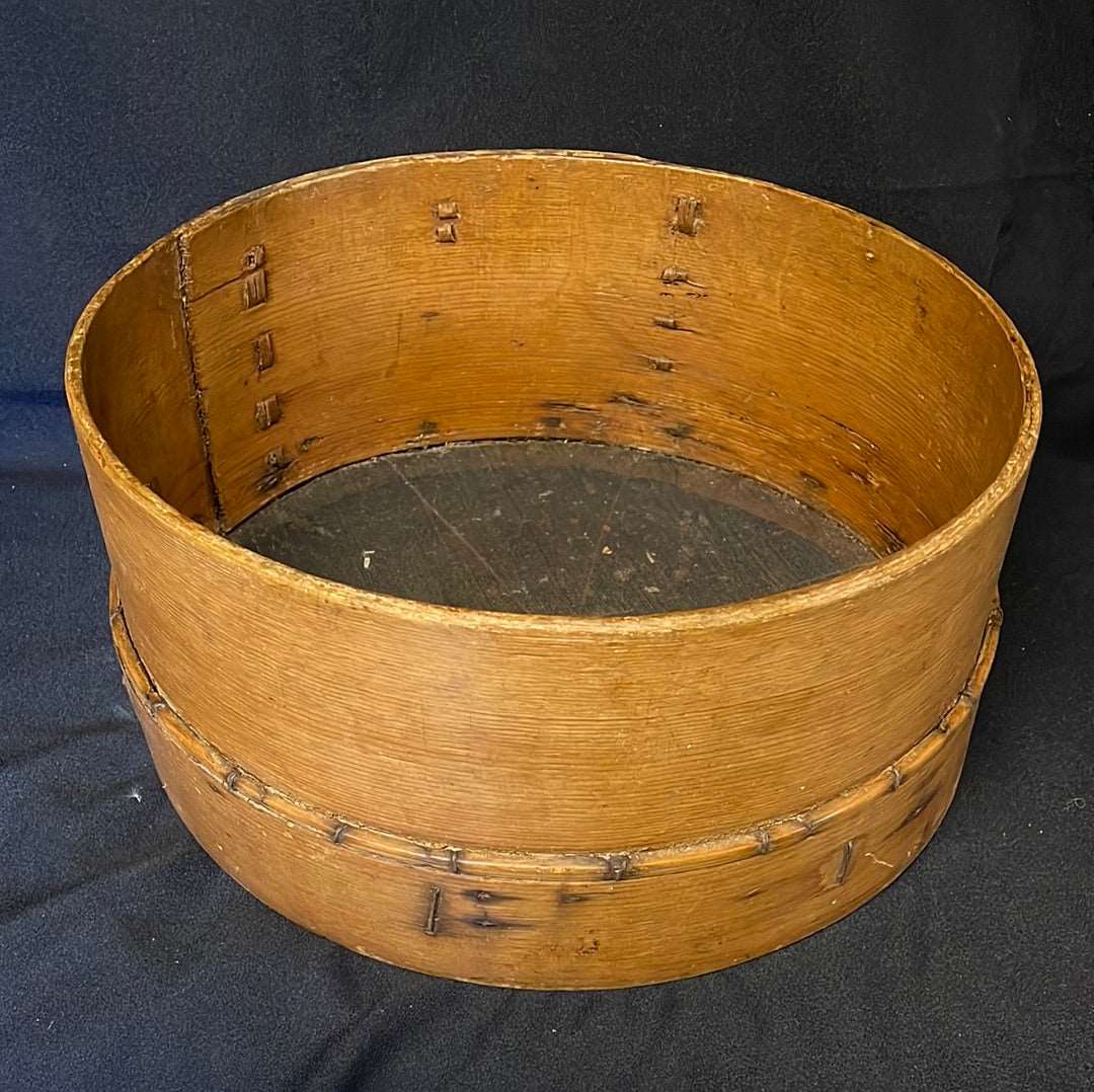 Vintage bent wood flour sieve.