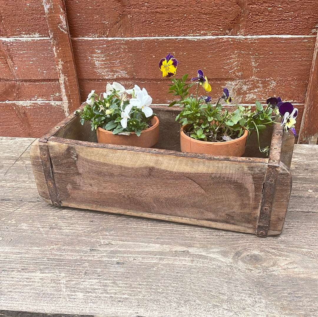 Side view of single Indian rustic wooden brick mould, Country Craft Cabin..