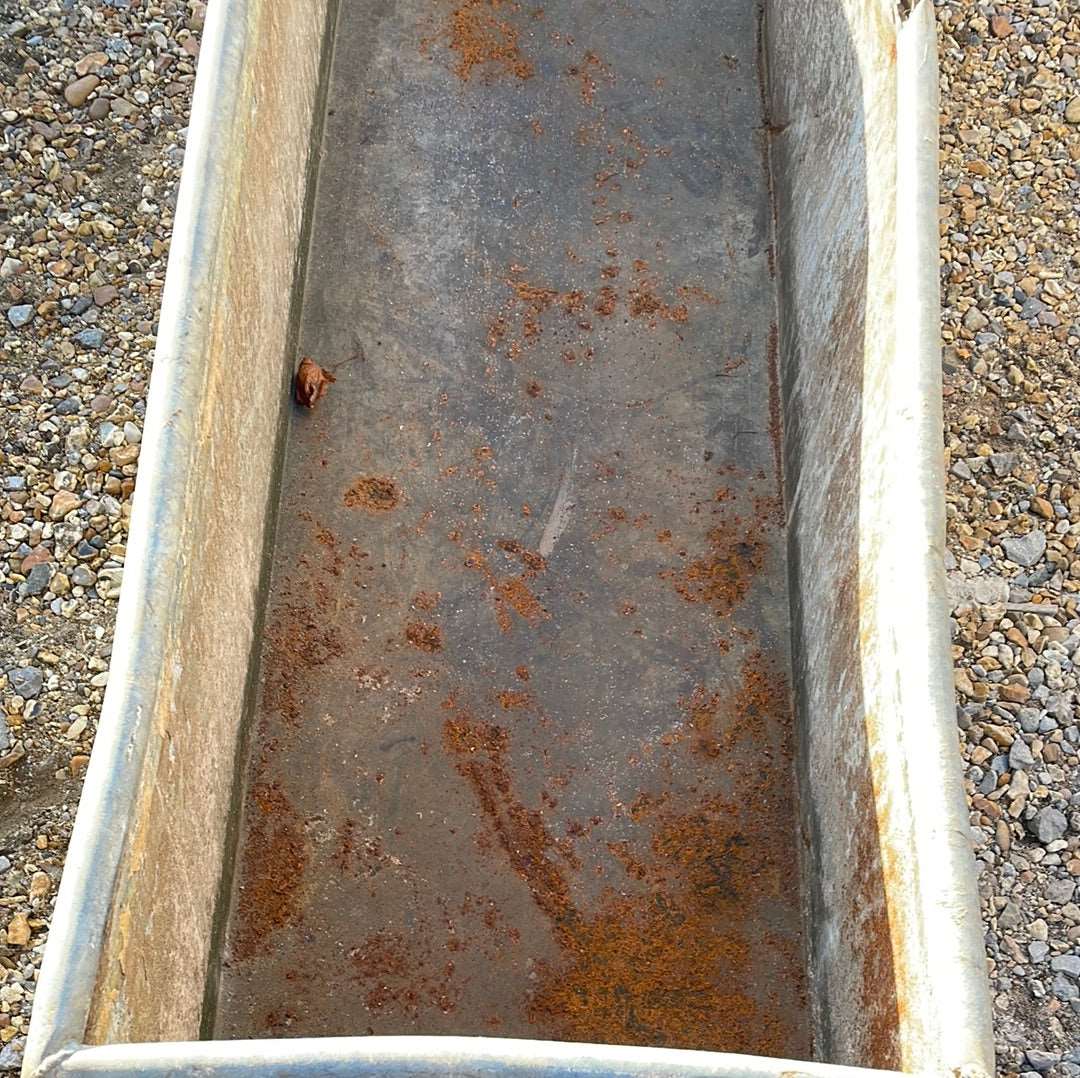 Vintage galvanised rustic water trough planter.