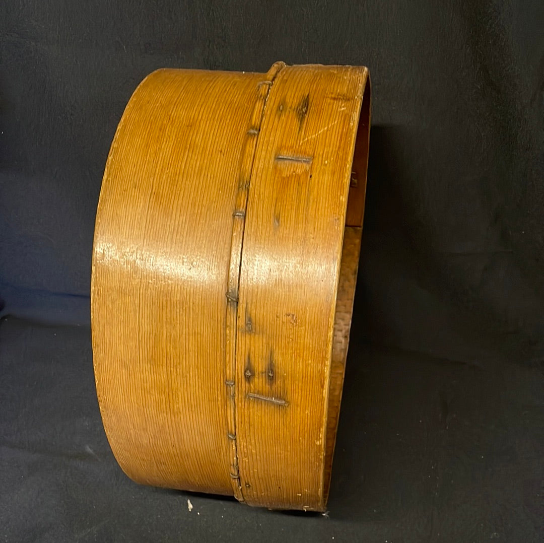 Vintage bent wood flour sieve.