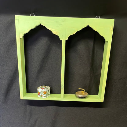 Wooden Indian temple style double sided shelf, light green.