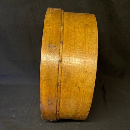 Vintage wooden sided grain sieve.