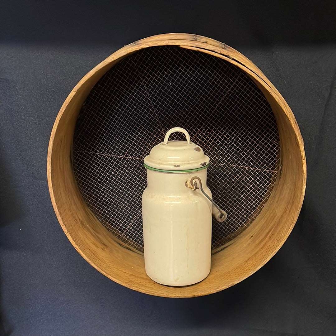 Vintage bent wood grain sieve.