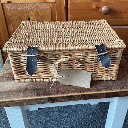 Small wicker hamper basket.